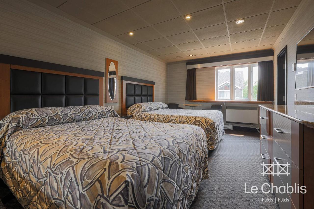 Hotel Le Chablis Cadillac Montreal Bagian luar foto